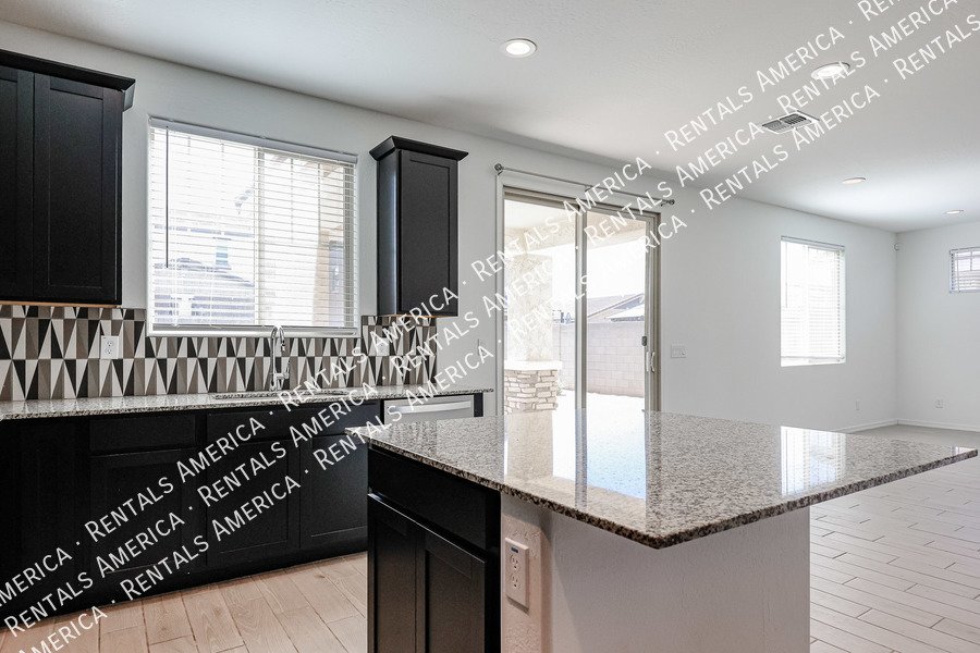 MOVE IN SPECIAL!!!! 5 bedroom 3 bath home in Camelback Ranch property image