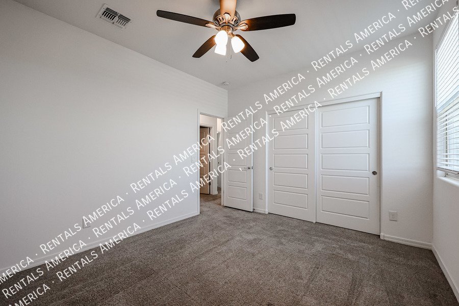 MOVE IN SPECIAL!!!! 5 bedroom 3 bath home in Camelback Ranch property image