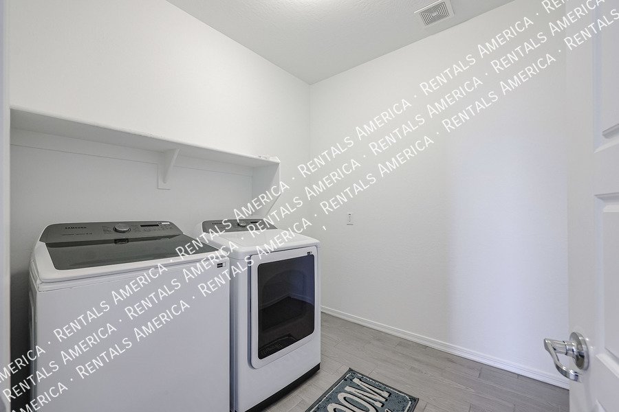 MOVE IN SPECIAL!!!! 5 bedroom 3 bath home in Camelback Ranch property image