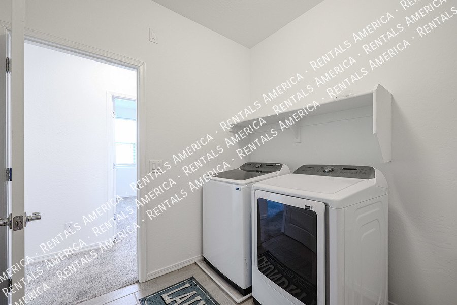 MOVE IN SPECIAL!!!! 5 bedroom 3 bath home in Camelback Ranch property image