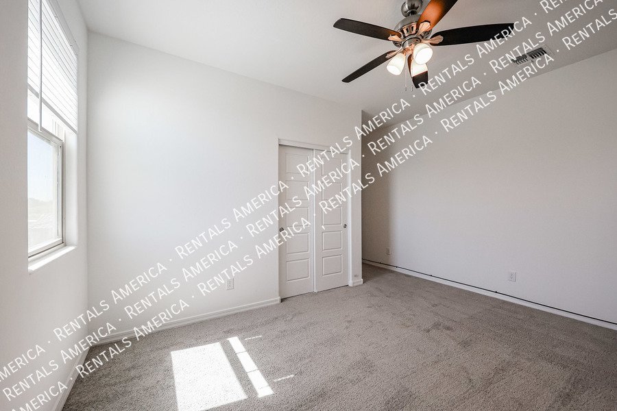 MOVE IN SPECIAL!!!! 5 bedroom 3 bath home in Camelback Ranch property image