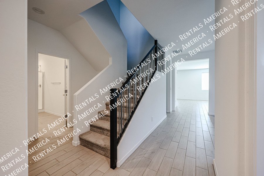 MOVE IN SPECIAL!!!! 5 bedroom 3 bath home in Camelback Ranch property image